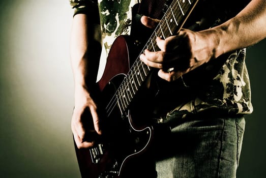 Man playing a guitar