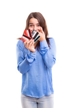 E-commerce concept - Happy woman holding credit cards