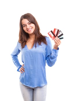 E-commerce concept - Happy woman holding credit cards