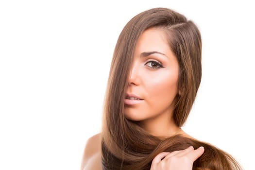 Beautiful Brunette Girl with healthy long hair - isolated over white