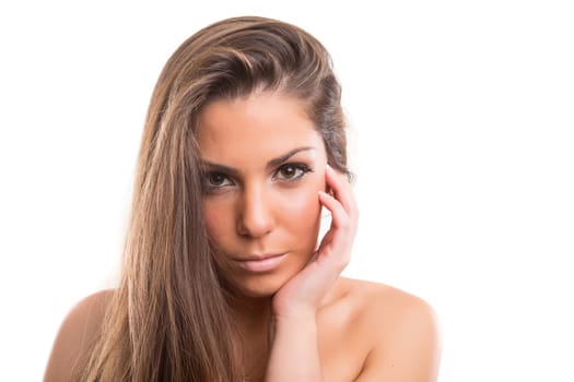 Beautiful woman with perfect skin posing over white