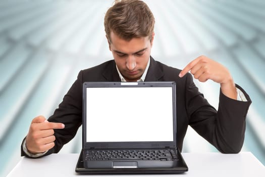 Young man presenting your product in a laptop computer