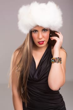 A beautiful young woman dressed with winter clothes