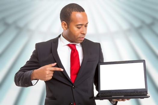 African business man presenting your product in a laptopcomputer