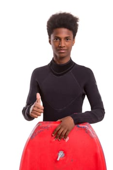 A young black bodyboarder posing in studio