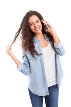Young beautiful woman at the phone, isolated over a white background