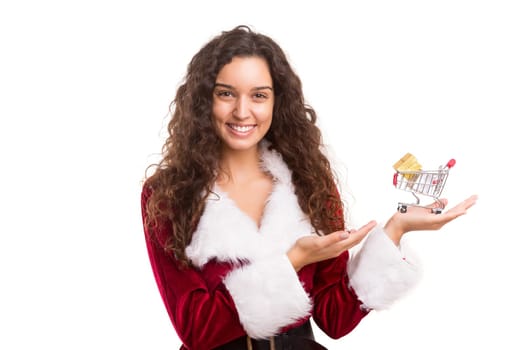 Young woman dress in Christmas costume, presenting your product