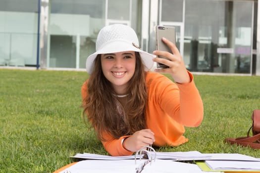 Young woman studying at the university campus