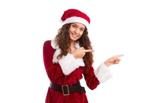 Young woman dress in Christmas costume, presenting your product