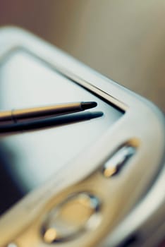 Close_up of a personal data assistant with a stylus