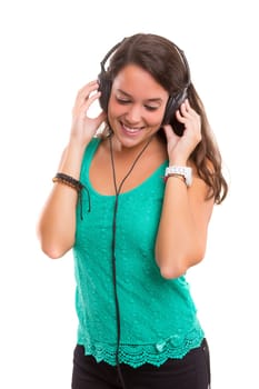 A Happy young woman listening to music