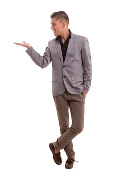Young man presenting your product, isolated over a white background