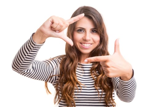 Young woman making framing key gesture - isolated over white