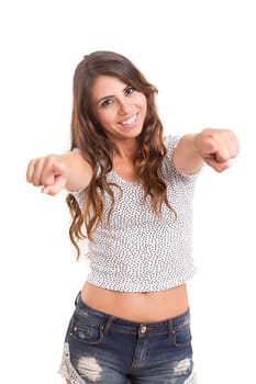 Young beautiful woman pointing at you, isolated over white