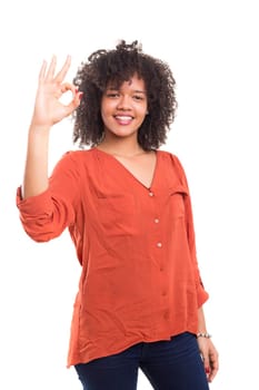 Beautiful african young woman signaling ok, isolated over white