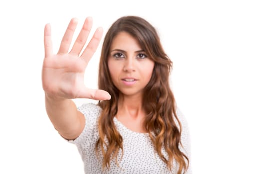 Business woman making stop sign - isolated over white