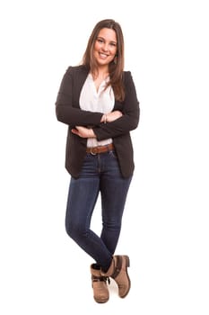 Beautiful young casual woman posing isolated over white