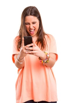 Young beautiful woman at the phone, isolated over a white background