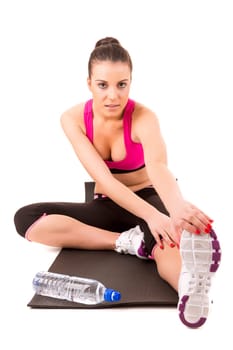 Young woman in great shape - fitness concept