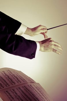 Close_up of conductorŽs hand holding a baton