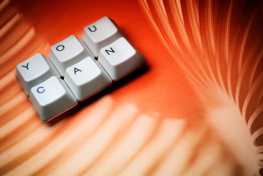 Close_up of text You Can made by computer keys