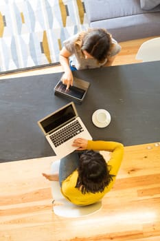 Beautiful young women at home studying for the final exams