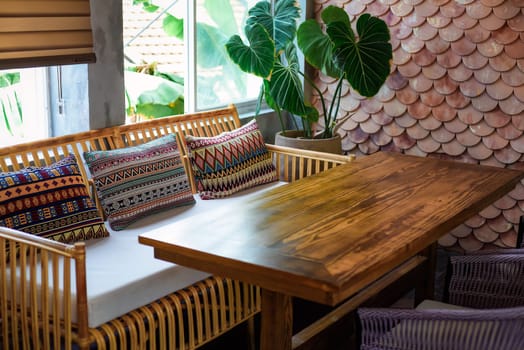Vintage style interior details with sofa and wooden table