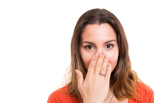 Surprised young woman isolated over white background
