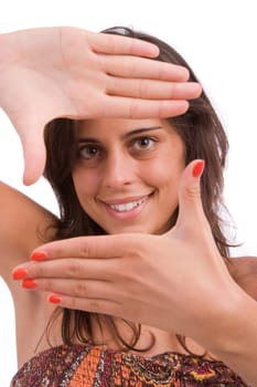 Young woman showing framing hand gesture, isolated over white