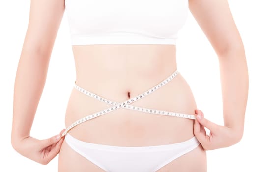 Young woman measuring her body - diet concept