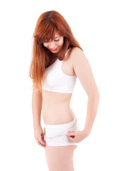 Young woman measuring her body - diet concept