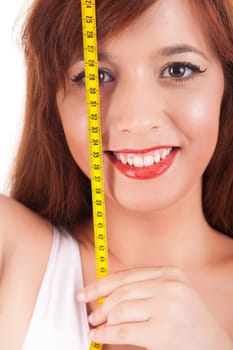 Young woman measuring her body - diet concept