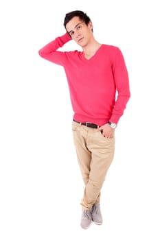 Young casual boy posing isolated