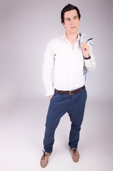 Young casual boy posing isolated