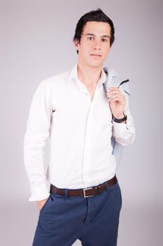 Young casual boy posing isolated