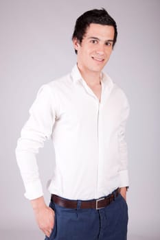 Young casual boy posing isolated