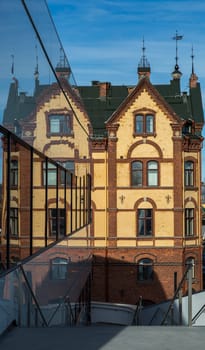 Old Building Reflected in Modern Windows in Umeå, Sweden