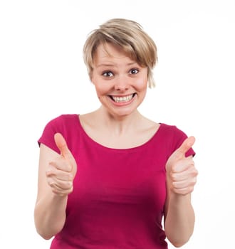 Young woman showing her thumbs up and having a big smile, isolated on white