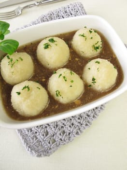 Potato dumplings with mushroom sauce