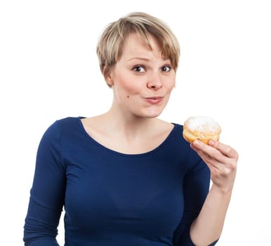 Pretty young woman about eating a donut, isolated on white