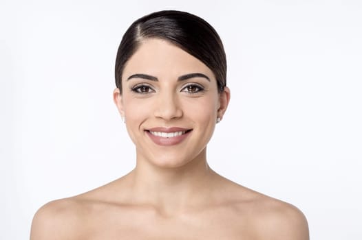 Topless pretty woman posing to camera