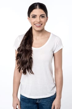 Pretty woman with long hair posing to camera