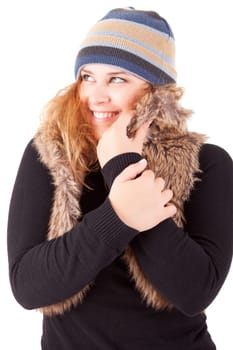 A beautiful young woman dressed for winter, over a white background