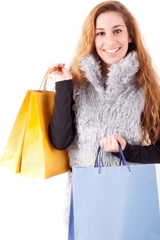 Young and beautiful woman with shopping bags