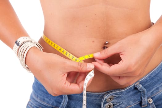 photography of a measuring tape around woman's waist