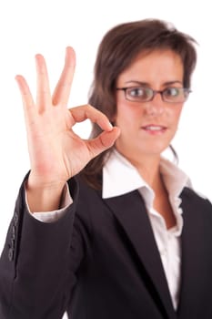 Business woman signaling ok - isolated over white