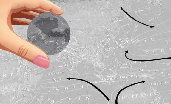 Human hand holding a sphere