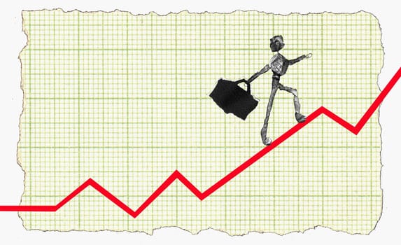 Figurine of a man walking on a line graph