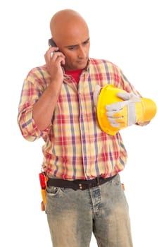Construction worker at the phone, isolated over white