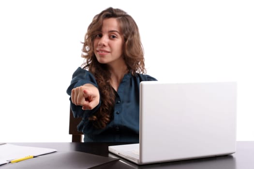 Young beautiful girl working with laptop - focus on hand
